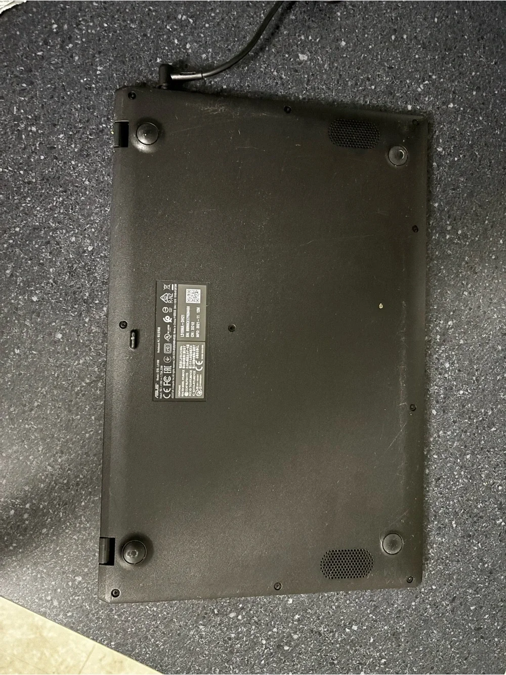 ASUS Black Laptop with Yellow-Accent Key